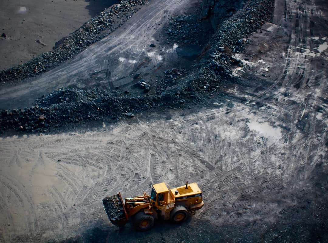 high-angle-photography-of-yellow-excavator-jbjp18srife